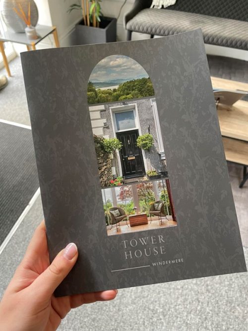 An eye-catching brochure for a tower house, featuring vibrant images and details that emphasise its cozy and welcoming design.