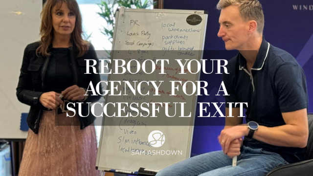 A woman and man discuss strategies in a business workshop. A whiteboard behind them shows PR and social campaign notes. Text overlay reads: "Reboot Your Agency for a Successful Exit."